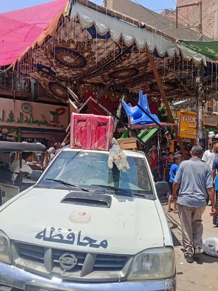 حملة لرفع الإشغالات وتيسير حركة المرور بشوارع مدينة سنورس بالفيوم.